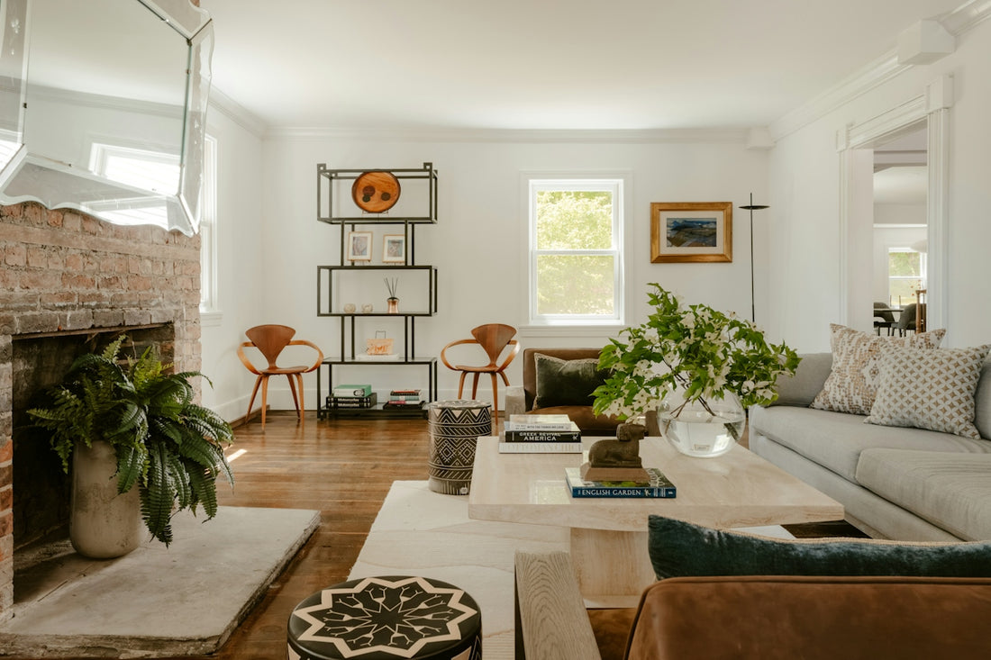 Elegant living room featuring a fireplace, sofa, and decorative accents