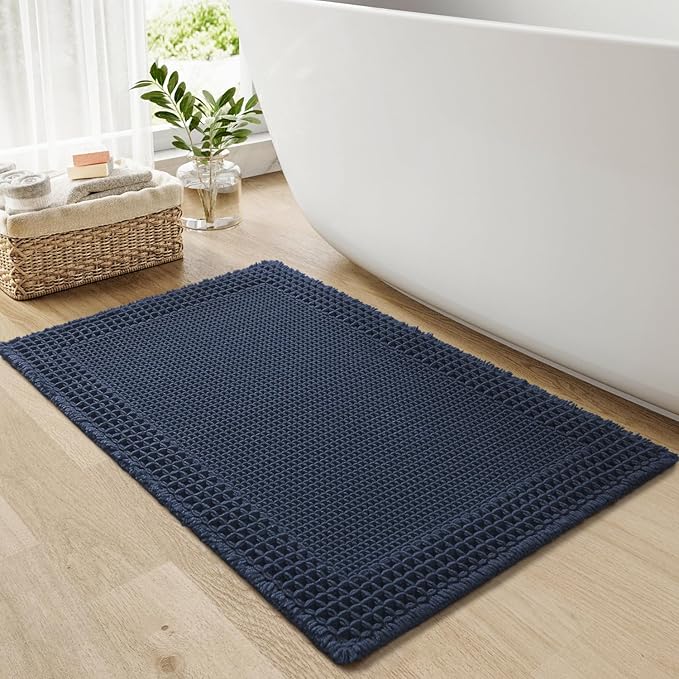 RESARE Waffle Bath Mat for Bathroom, Super Absorbent Bathroom Rugs Non Slip Machine Washable, Ultra Soft Quick Dry Boho Bath Rugs with Tassels for Floor, Upgraded Bordered Design, 18"x30" Navy